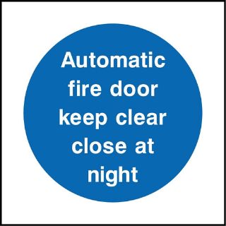 Picture of "Automatic Fire Door Keep Clear Close At Night" Sign
