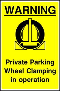 Picture of Warning Private parking wheel clamping in operation 