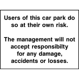 Picture of "Users Of This Car Park Do So At Their Own Risk" Sign