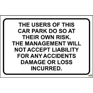 Picture of The Users Of This Car Park Do So At Their Own Risk. The Management Will Not Acce